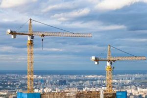 Dominating the Skyline: Towering Cranes Atop Skyscrapers Discover the World's Most Iconic Skyscrapers: Architecture, Design, and Innovation Dominating the Skyline: Towering Cranes Atop Skyscrapers | Discover the World's Most Iconic Skyscrapers: Architecture, Design, and Innovation